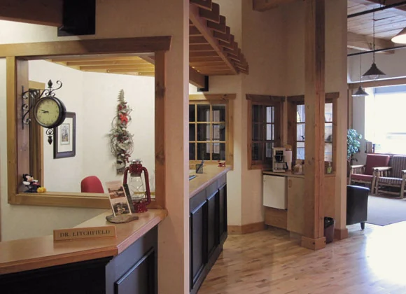 The hallway and reception area with wood floors
