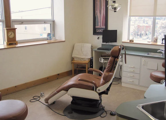 A treatment room at the practice with a window onto Main Street